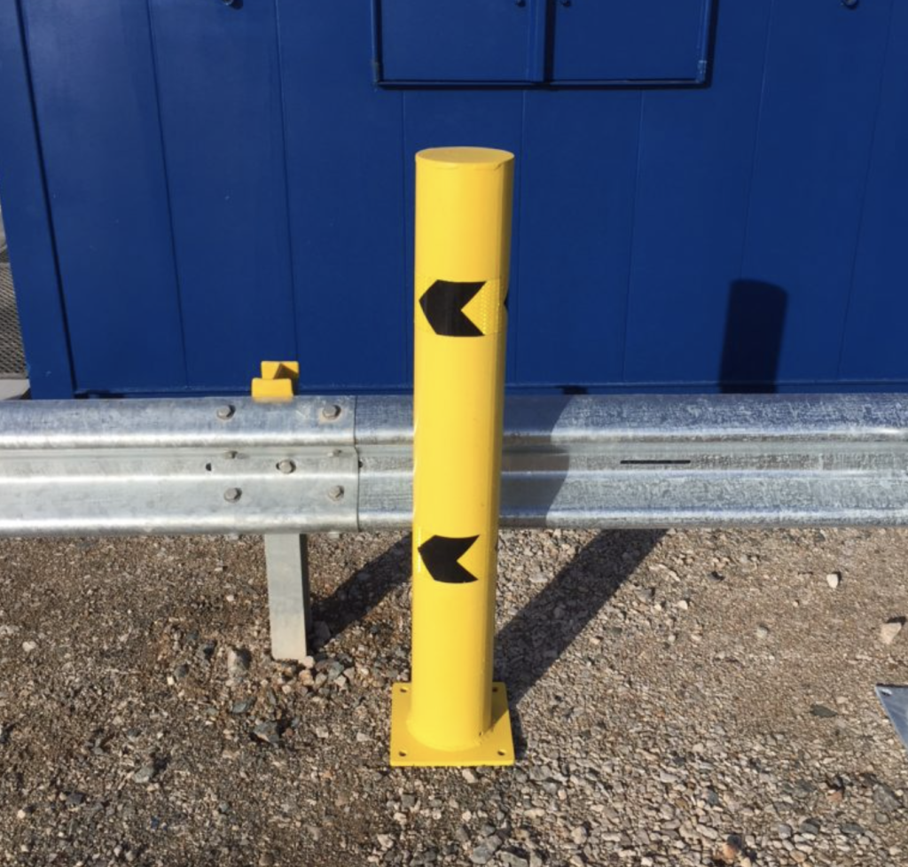 Yellow bolt down bollard
